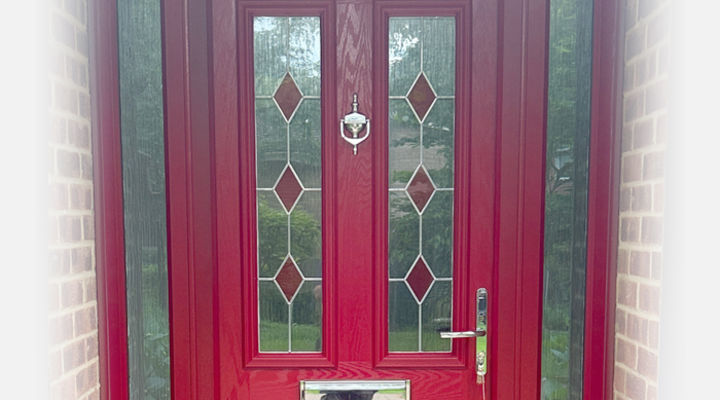 Red composite front door with red diamond glass