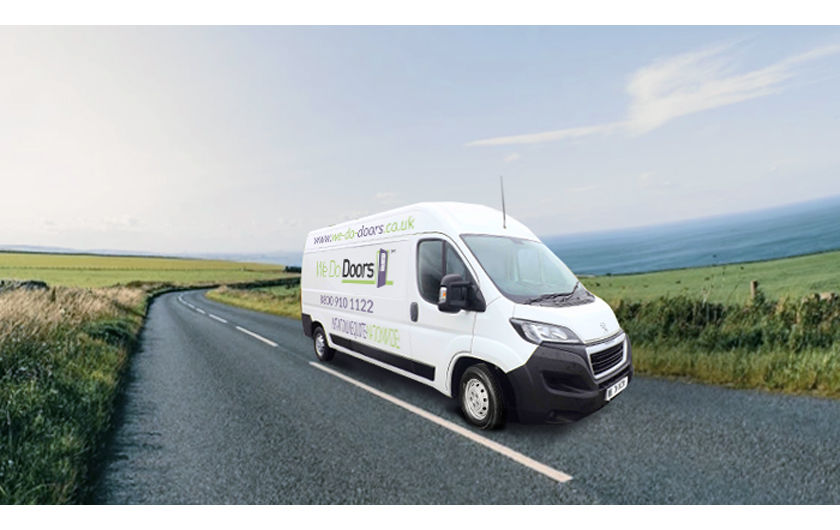 We Do Doors delivery van on a road