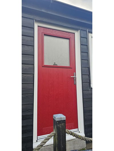 Red composite cottage door with large square glass