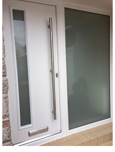 White modern style composite door with bar handle