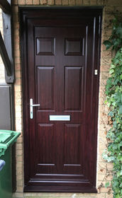 Harrow Solid rosewood upvc front door