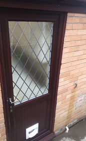 Cardiff Diamond Lead mahogany upvc back door with catflap