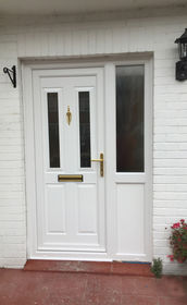 Leeds Sella white upvc front door with side panel