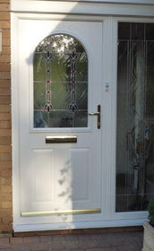 Devon Fia white composite front door with side panel