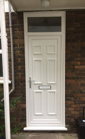 Harrow Solid white upvc front door with toplight