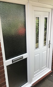 Leeds Sella white upvc back door with side panel