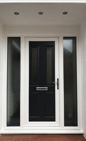 Leeds Sella anthracite grey upvc front door with toplights and side panels