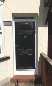 Surrey Anice black composite front door with toplight