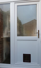 Plymouth Attina white upvc back door with catflap and side panel