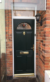 Surrey Fia green composite front door with toplight