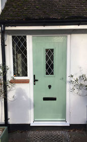 Cumbria Diamond Lead chartwell green composite front door with flag window