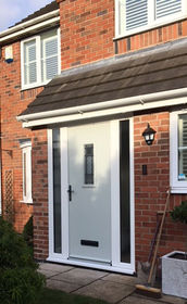 Cumbria Victoriana pebble composite front door with side panels