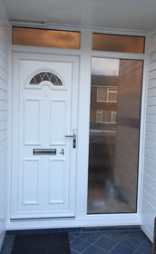 Enfield Diamond Lead white upvc front door with toplights & side panel