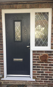 Cumbria Diamond Lead anthracite grey composite front door with flag window