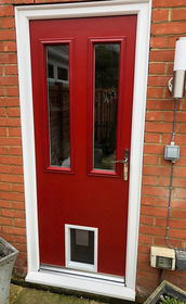 Dartford Anice red composite back door with pet door